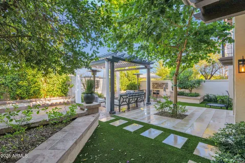 a outdoor living space with furniture and garden view