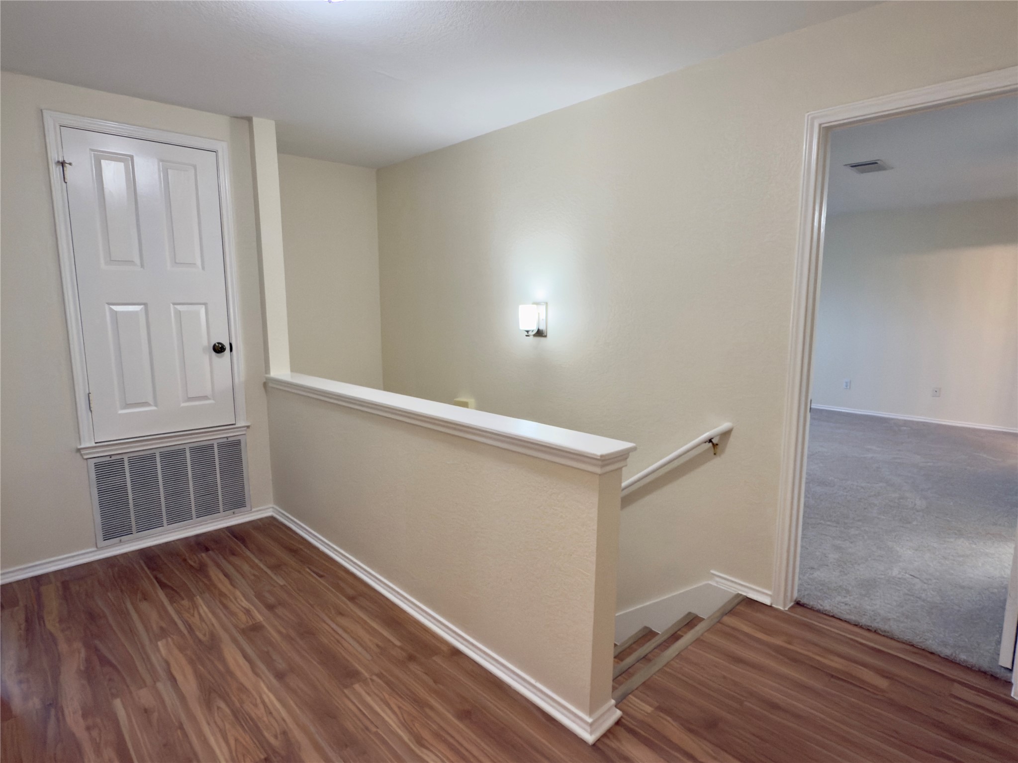 1206 Devil Ridge Cedar Park, TX 78613 - Photo 18 of 38 an empty room with wooden floor and windows