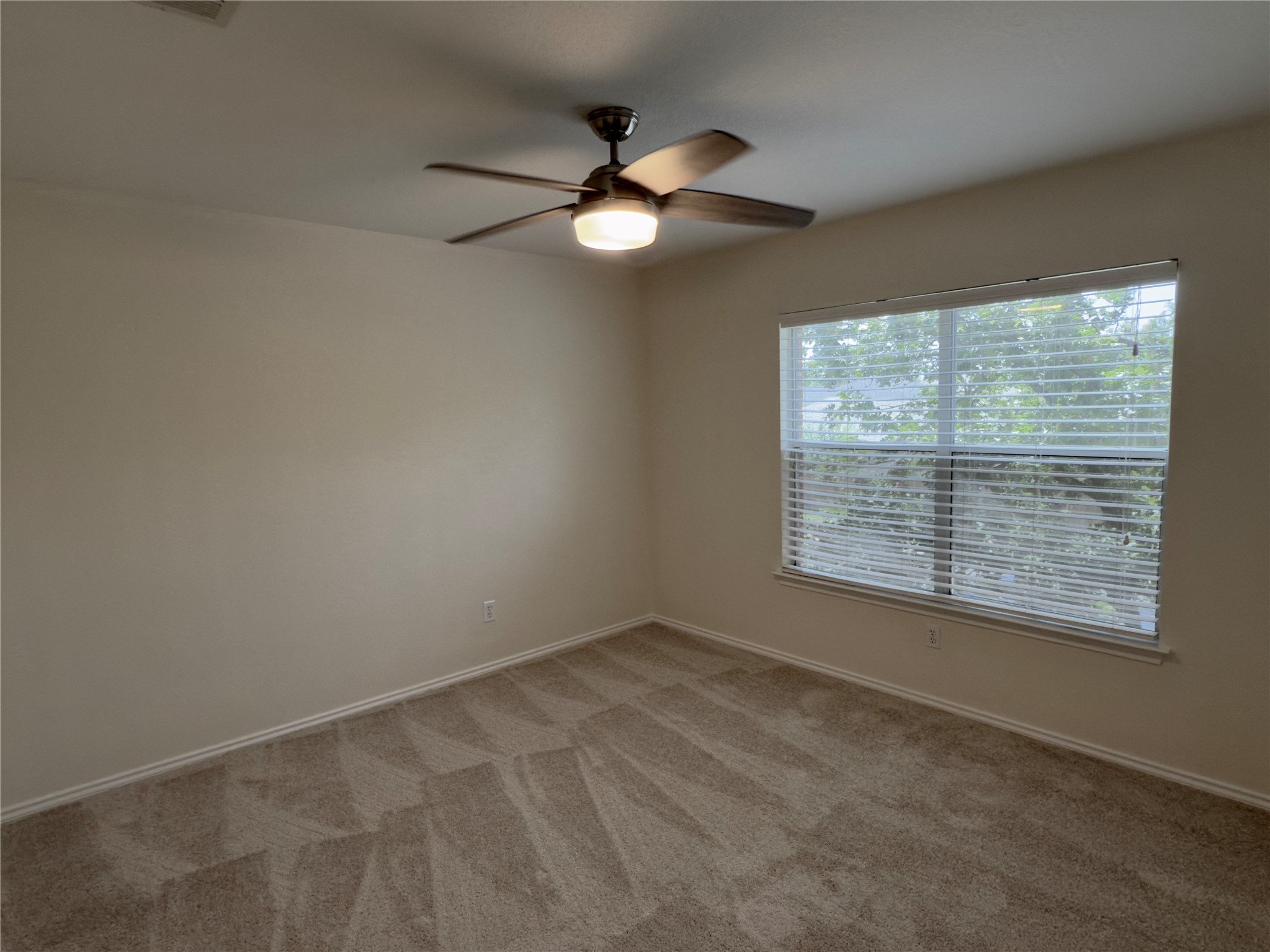 1206 Devil Ridge Cedar Park, TX 78613 - Photo 28 of 38 a view of an empty room with a window