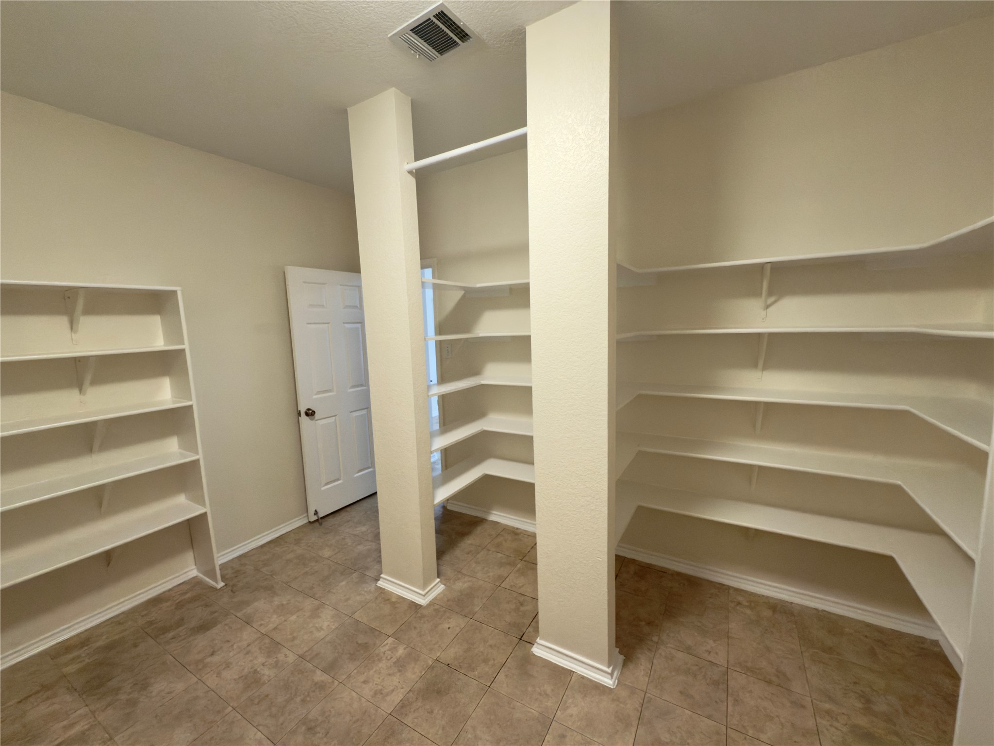 1206 Devil Ridge Cedar Park, TX 78613 - Photo 10 of 38 a view of an empty walk in closet