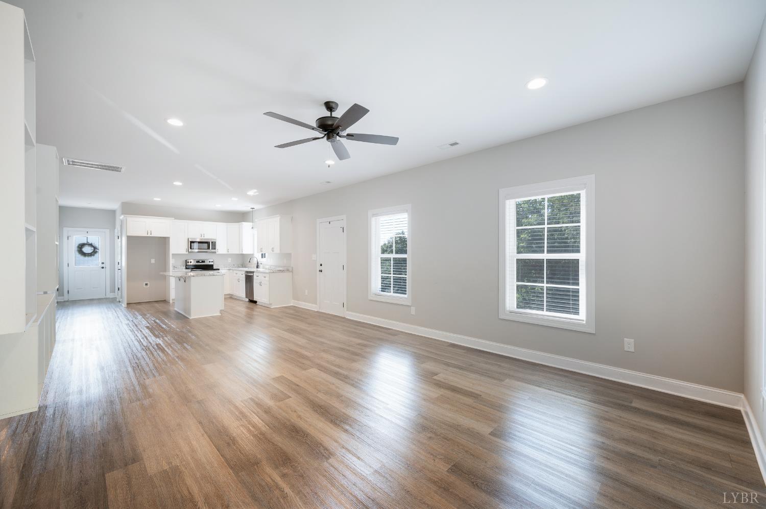 1200 Founding Way Road Bedford, VA 24523 - Photo 13 of 36 a view of empty room with wooden floor and window