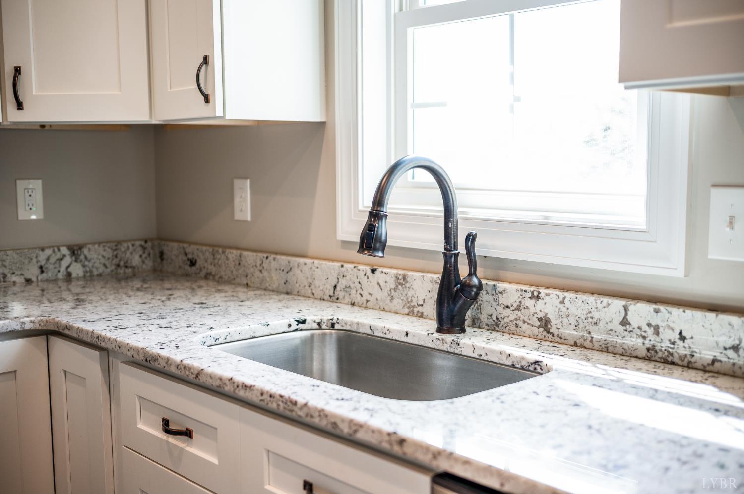 1200 Founding Way Road Bedford, VA 24523 - Photo 17 of 36 a kitchen with a sink and cabinets