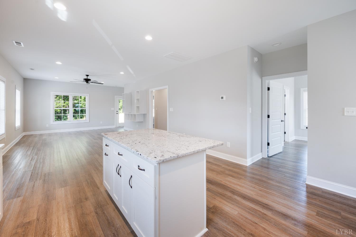 1200 Founding Way Road Bedford, VA 24523 - Photo 18 of 36 a kitchen with a wooden floor and window