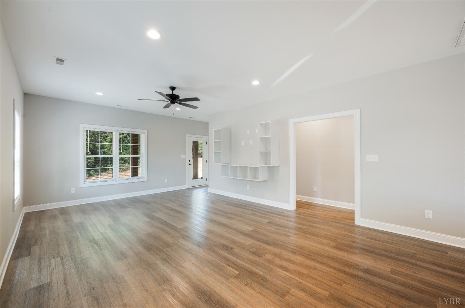 1200 Founding Way Road Bedford, VA 24523 - Photo 20 of 36 a view of an empty room with wooden floor and a window