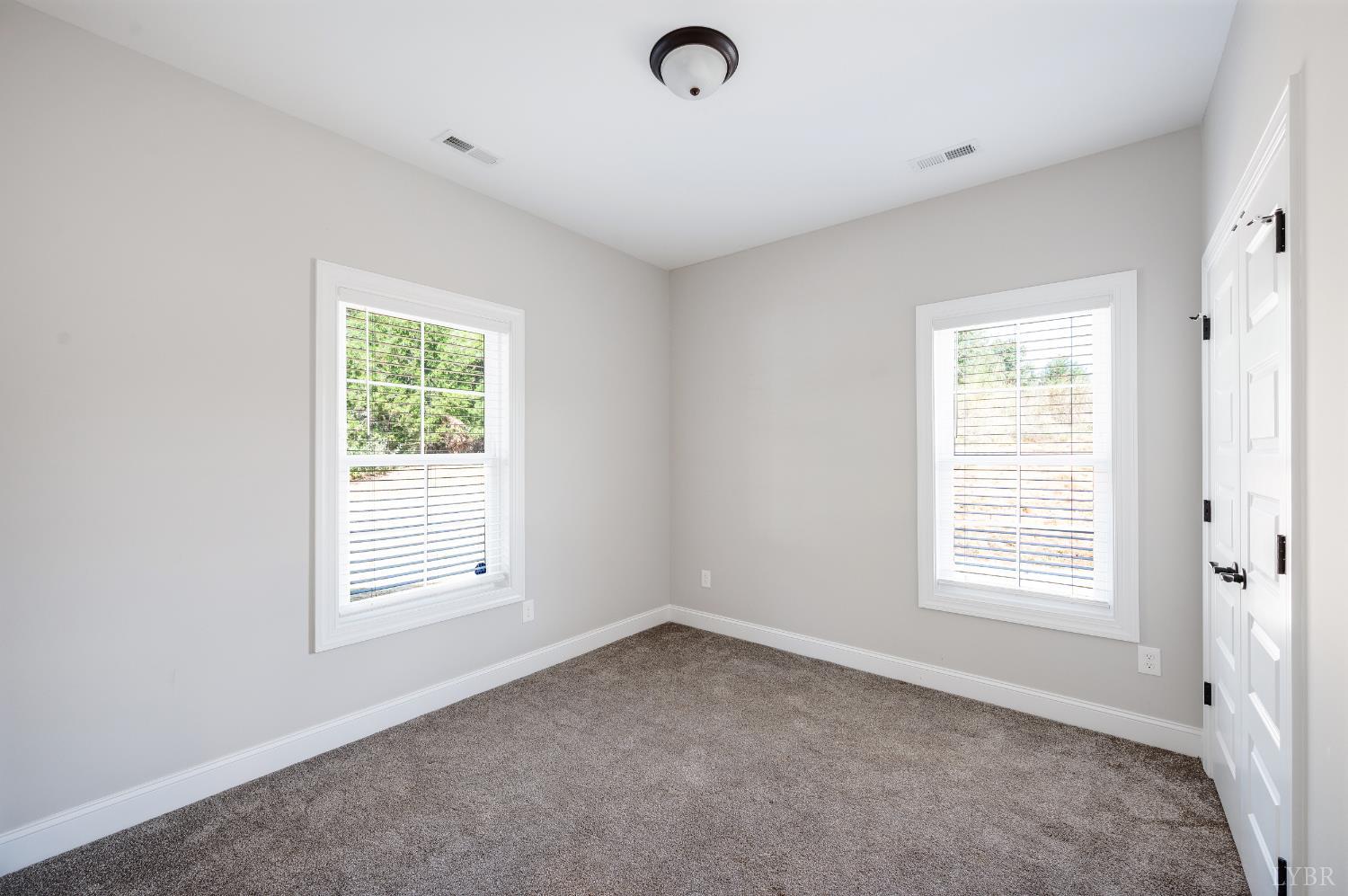 1200 Founding Way Road Bedford, VA 24523 - Photo 28 of 36 an empty room with windows