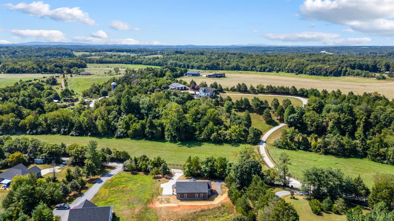 1200 Founding Way Road Bedford, VA 24523 - Photo 34 of 36 a view of a city with lush green forest
