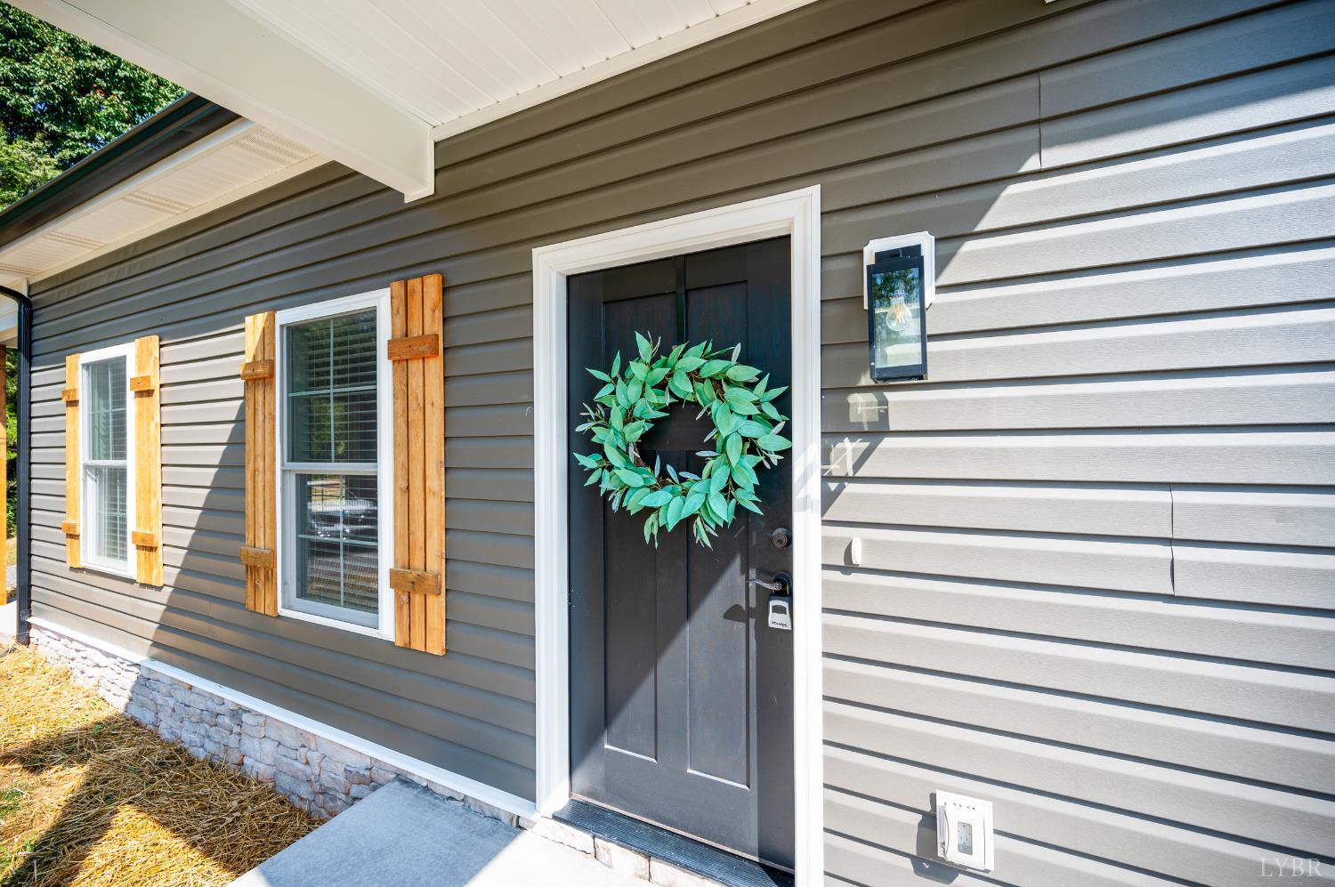 1200 Founding Way Road Bedford, VA 24523 - Photo 9 of 36 a view of a house with a potted plant
