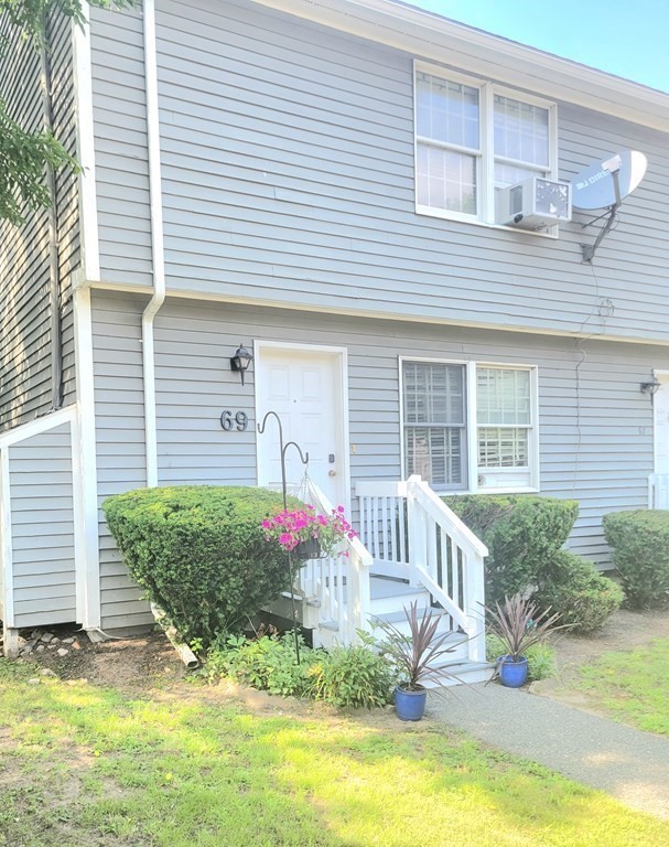 a front view of house with yard