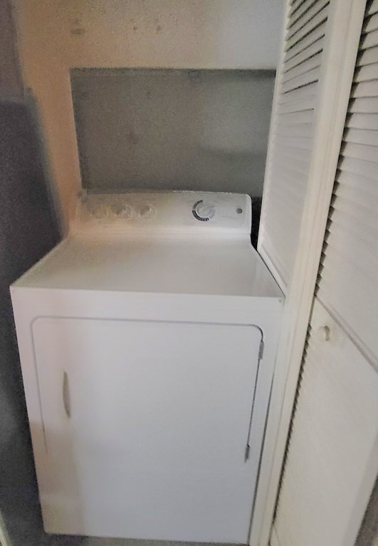 69 Fuller Street, Unit 69 Boston, MA 02124 - Photo 18 of 18 a close up view of washer and dryer