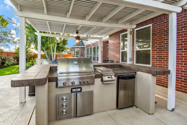 front view of a house with a swimming pool