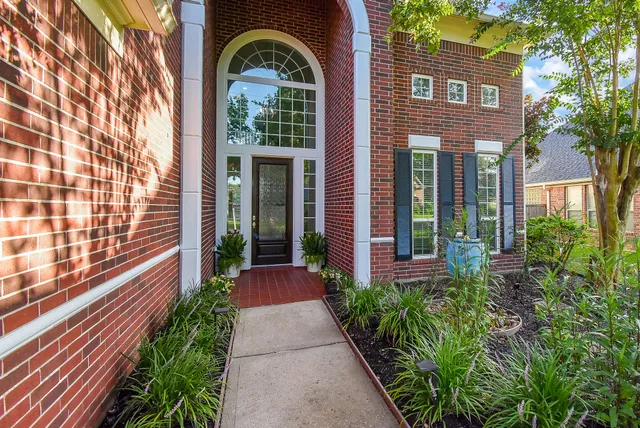 a front view of a house with a porch