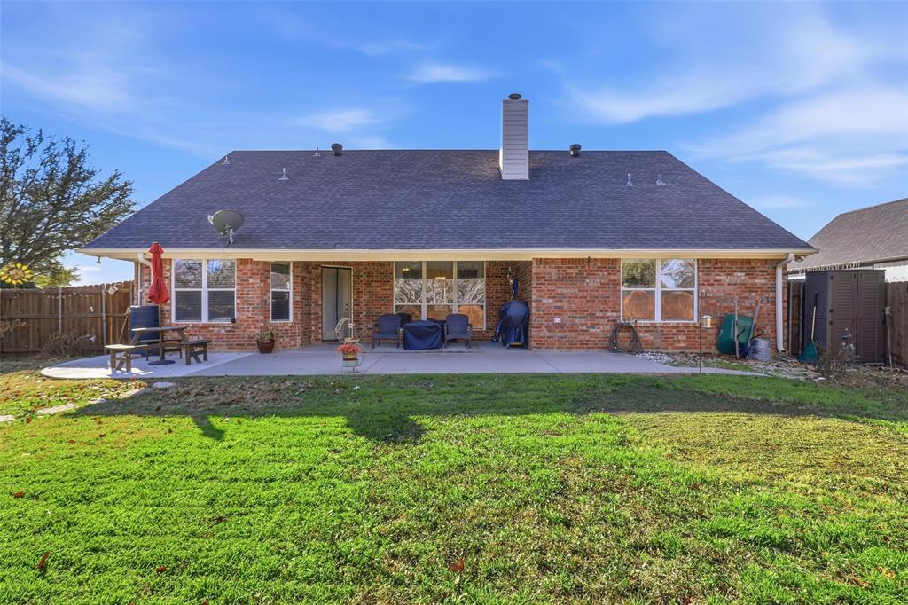 3207 Crossbridge Circle Granbury, TX 76049 - Photo 28 of 29 a view of a house with a yard