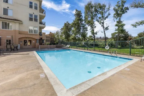a view of outdoor space swimming pool and lake view