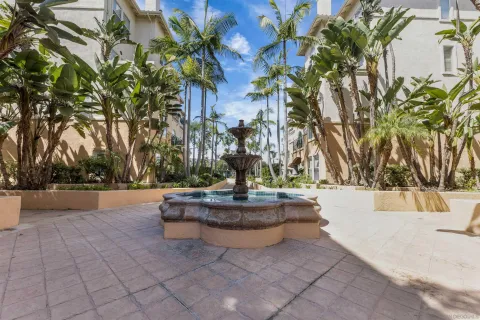 a view of a swimming pool with a yard