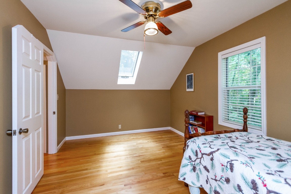 161 Curlicue Road Sewanee, TN 37375 - Photo 14 of 50 a bedroom with a bed and a window