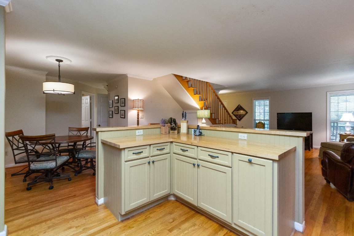 161 Curlicue Road Sewanee, TN 37375 - Photo 35 of 50 a kitchen with a sink cabinets and wooden floor