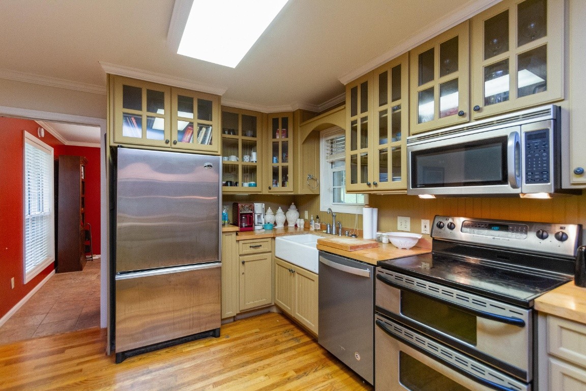 161 Curlicue Road Sewanee, TN 37375 - Photo 37 of 50 a kitchen with stainless steel appliances granite countertop a refrigerator and a stove top oven