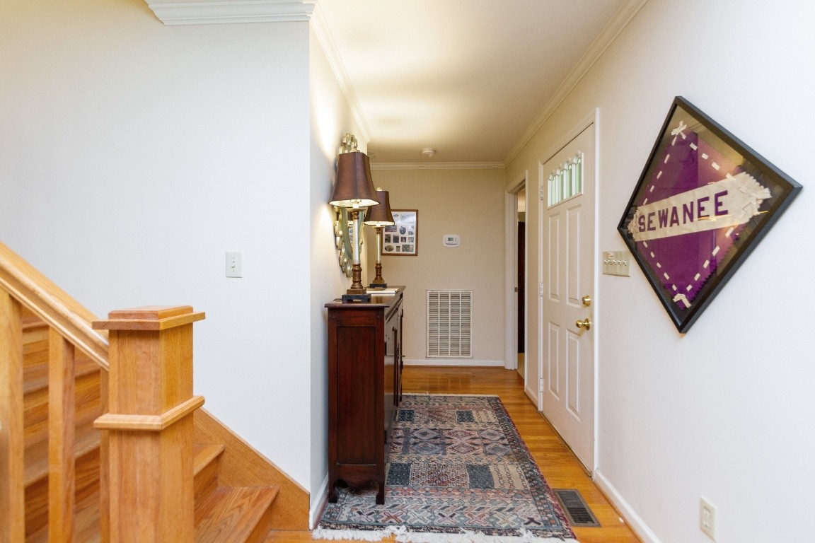 161 Curlicue Road Sewanee, TN 37375 - Photo 41 of 50 a view of a hallway to a house with wooden floor