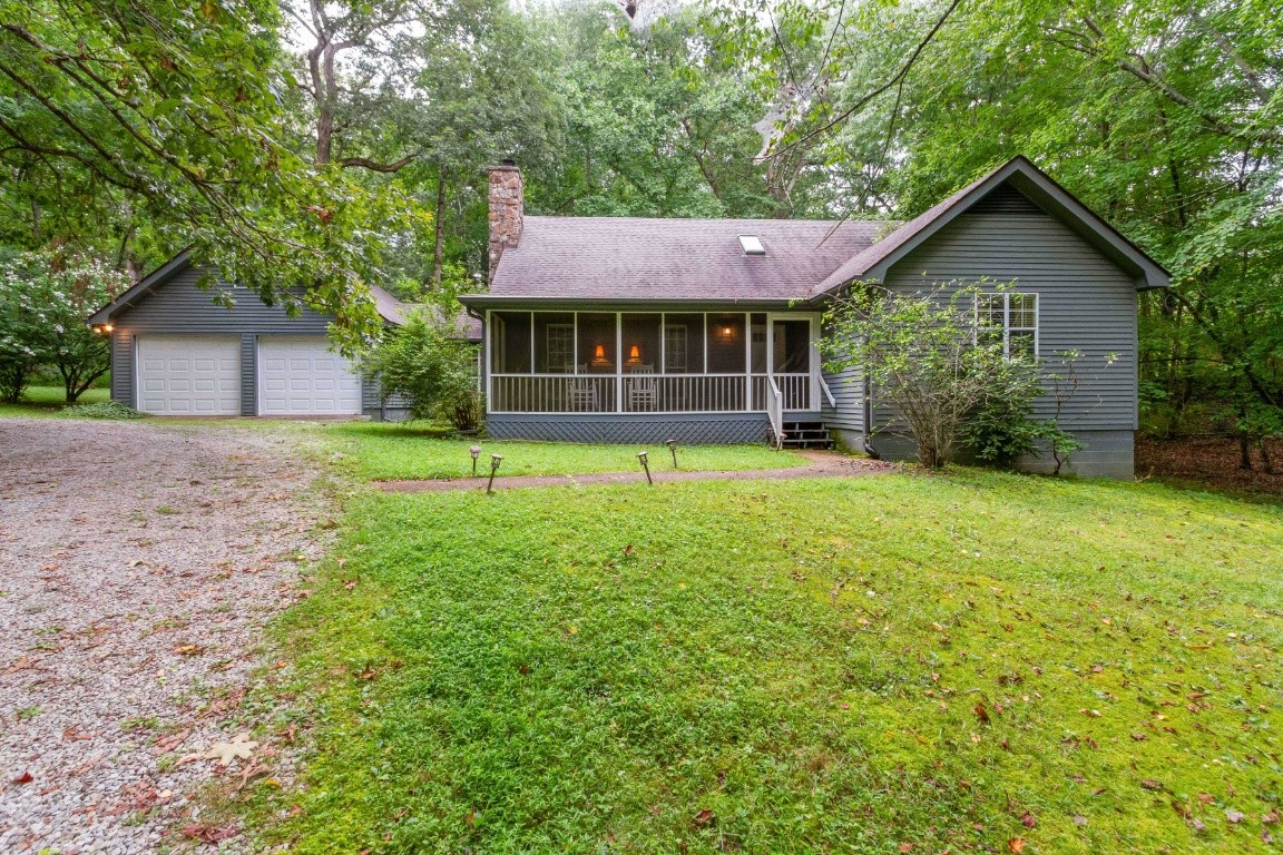 161 Curlicue Road Sewanee, TN 37375 - Photo 50 of 50 a front view of a house with a yard