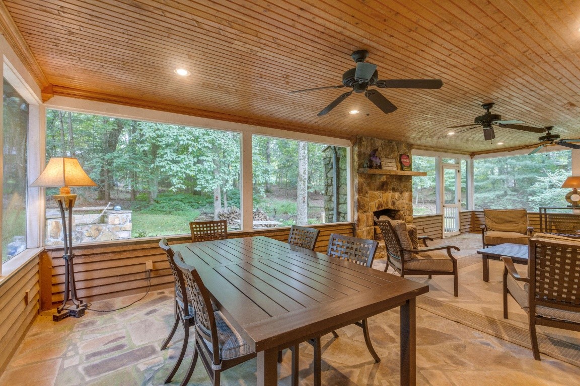 161 Curlicue Road Sewanee, TN 37375 - Photo 10 of 50 a view of a patio with a table chairs and a backyard