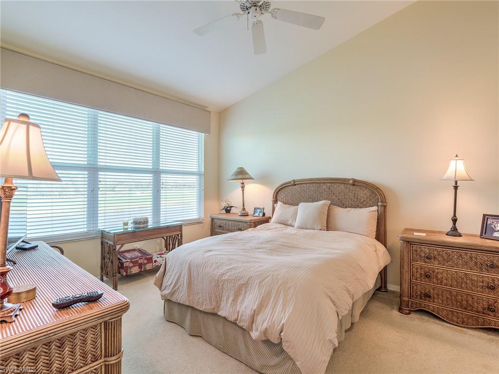 9830 Spring Run Boulevard, Unit 3408 Estero, FL 34135 - Photo 12 of 24 a bedroom with a bed and a window
