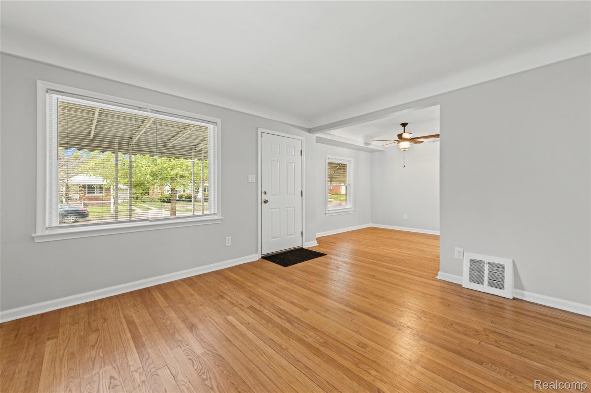 19720 Edinborough Road Detroit, MI 48219 - Photo 11 of 30 Foyer with light wood-type flooring and a ceiling fan