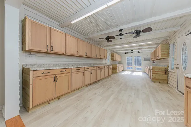 a open kitchen with cabinets