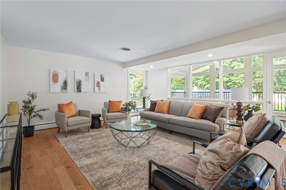 210 West Hillcrest Avenue Aylett, VA 23009 - Photo 11 of 50 a living room with furniture and a large window