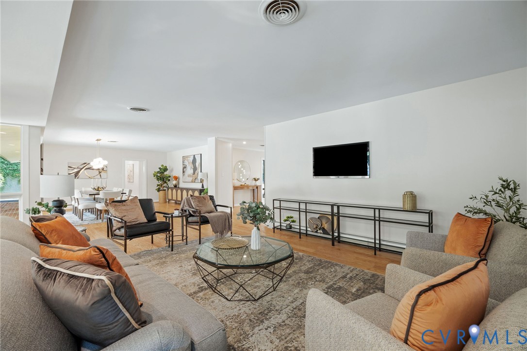 210 West Hillcrest Avenue Aylett, VA 23009 - Photo 13 of 50 a living room with furniture and a flat screen tv