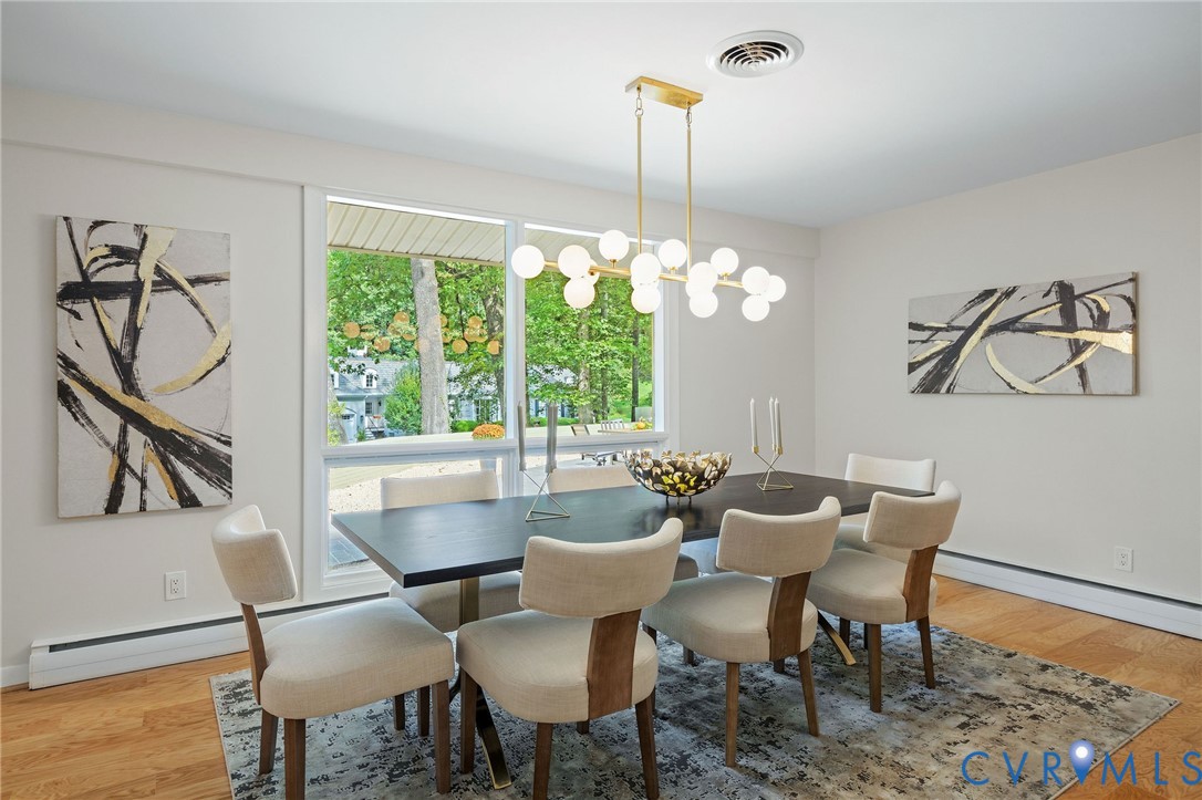 210 West Hillcrest Avenue Aylett, VA 23009 - Photo 15 of 50 a view of a dining room with furniture window and wooden floor