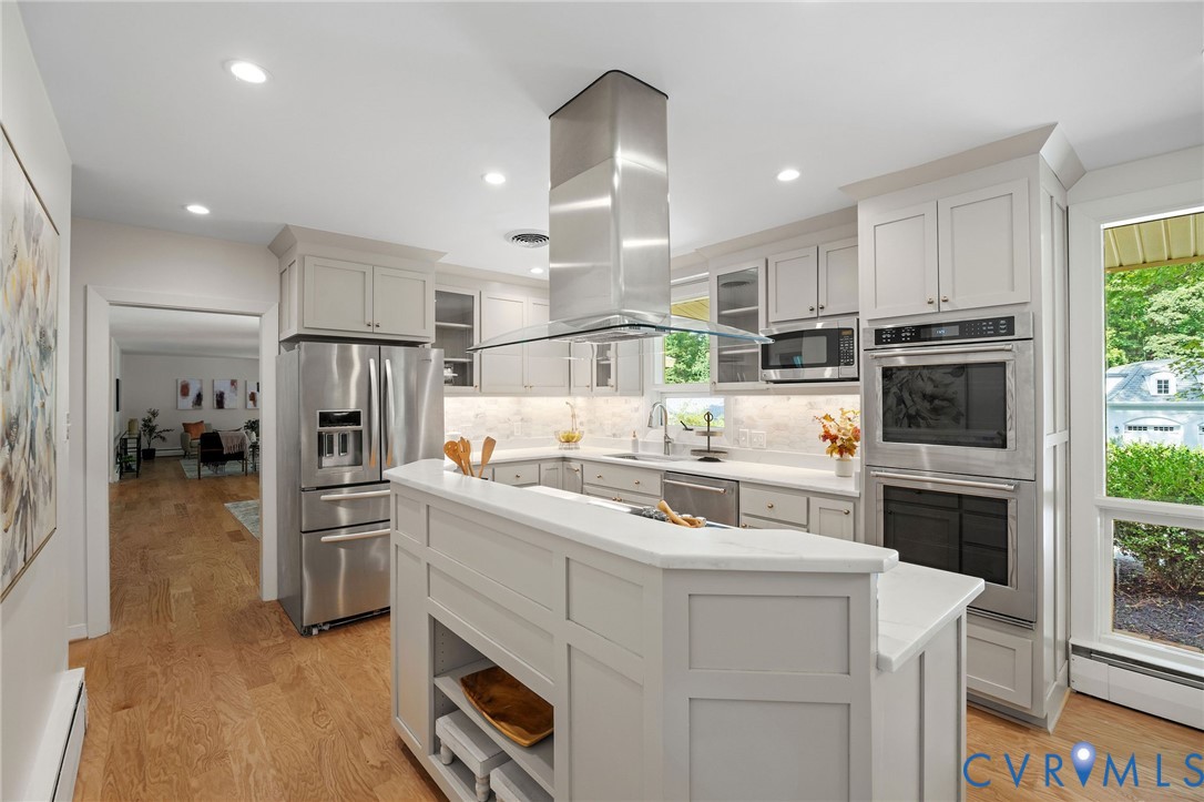 210 West Hillcrest Avenue Aylett, VA 23009 - Photo 17 of 50 a kitchen with white cabinets and stainless steel appliances