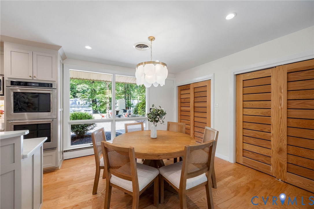210 West Hillcrest Avenue Aylett, VA 23009 - Photo 20 of 50 a dining room with furniture a window and a kitchen view