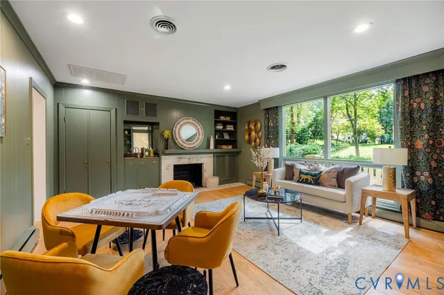 a living room with furniture and a table