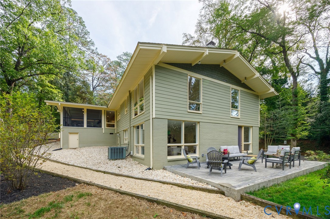210 West Hillcrest Avenue Aylett, VA 23009 - Photo 46 of 50 a view of house with chairs and table in a patio
