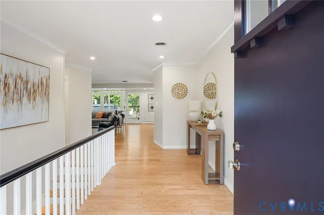 a view of a hallway view with living room
