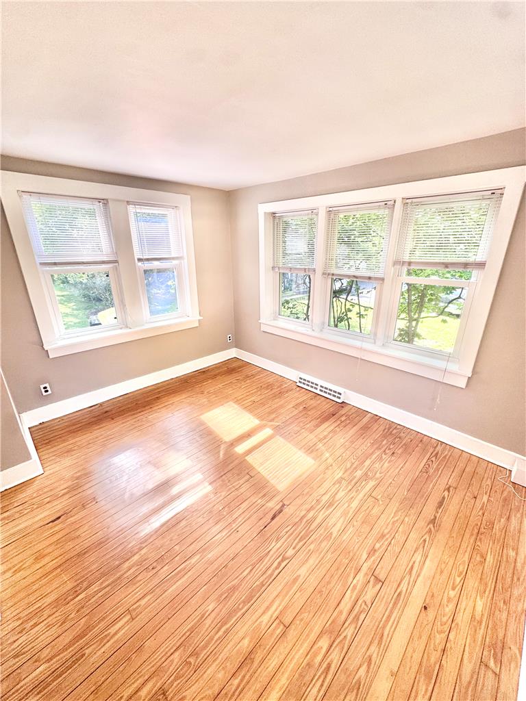5454 Camp Meeting Road Center Valley, PA 18034 - Photo 6 of 27 Natural light bathes this comfortable room, highlighting the gleaming hardwood floors.