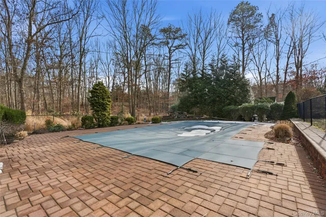 a view of a backyard of the house