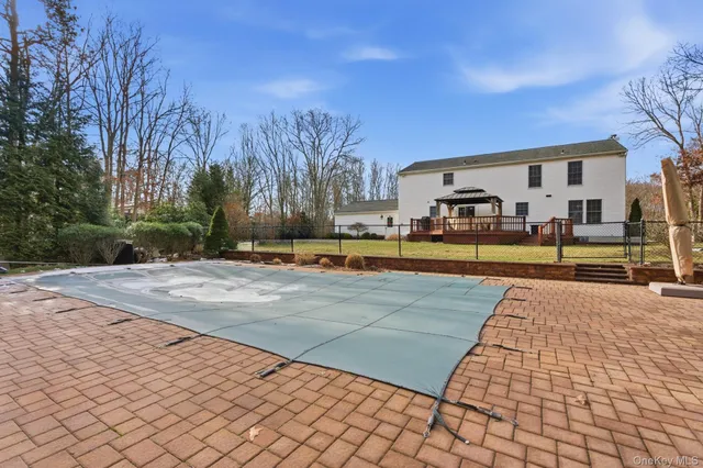 a view of a building with a yard