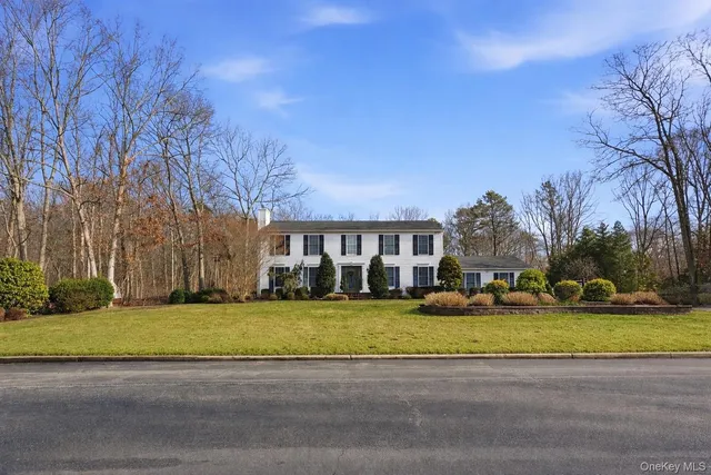 a view of a street with houses on both side of it