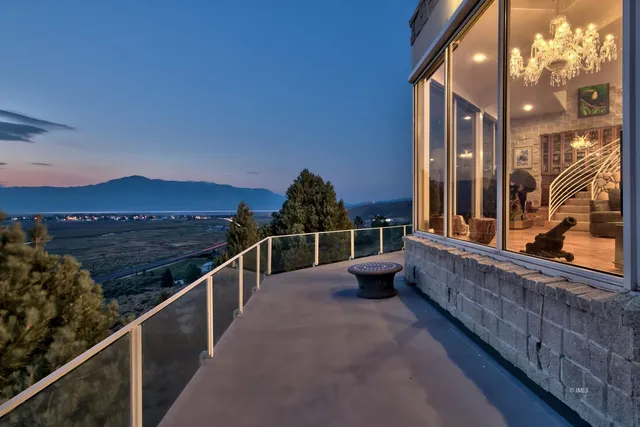 a view of balcony with furniture