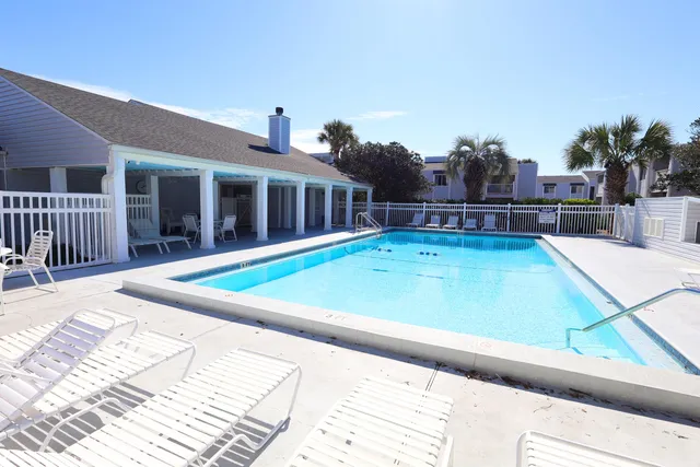 a view of a house with swimming pool