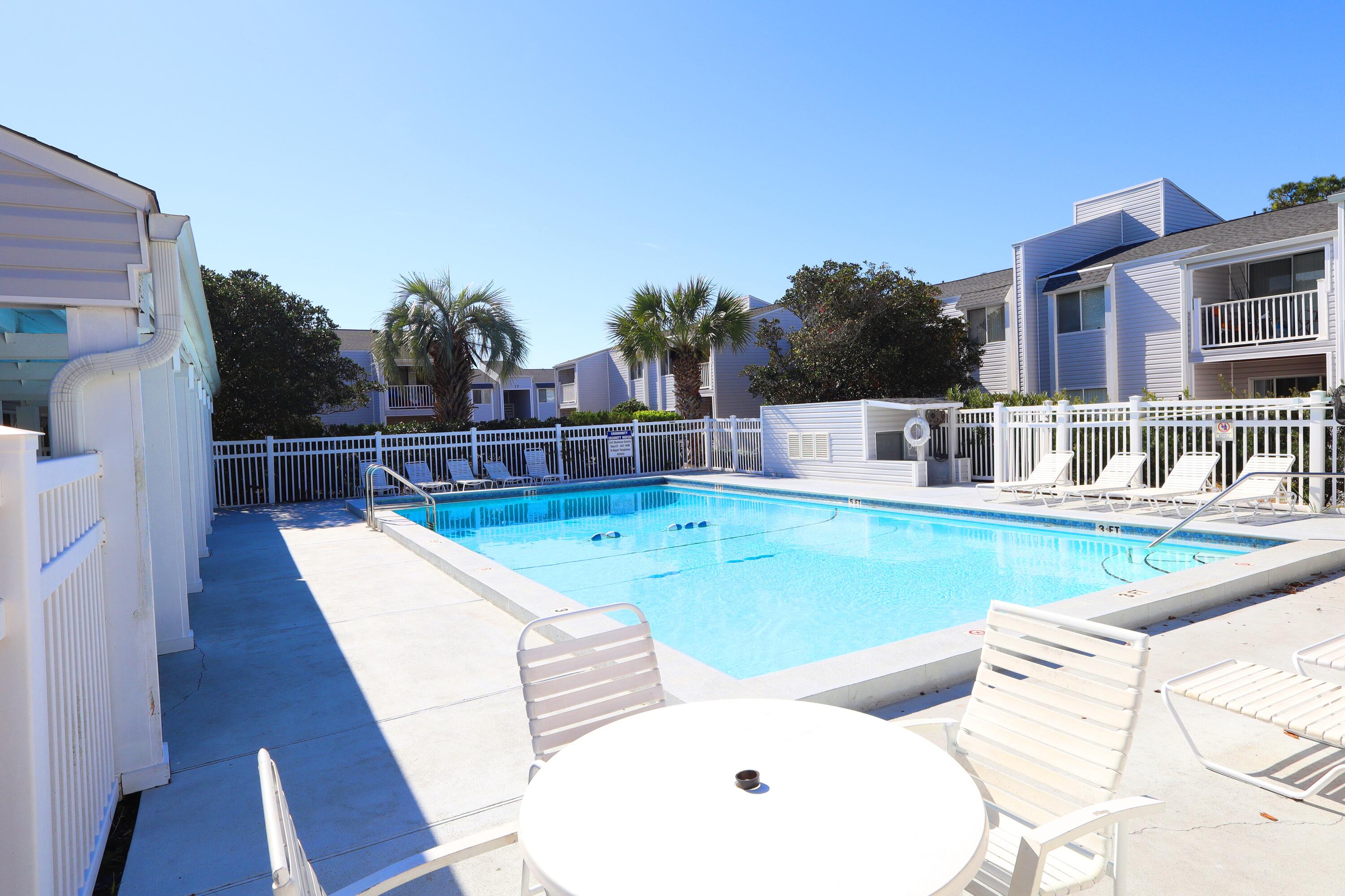 101 Old Ferry Road, Unit 36D Shalimar, FL 32579 - Photo 13 of 17 a view of a swimming pool with a patio