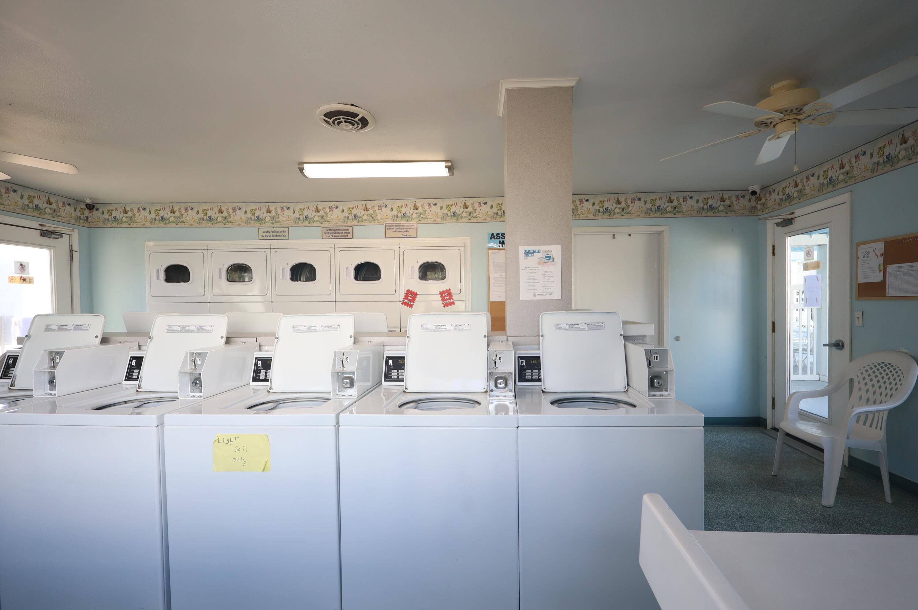 101 Old Ferry Road, Unit 36D Shalimar, FL 32579 - Photo 15 of 17 a bathroom with a sink mirror and vanity