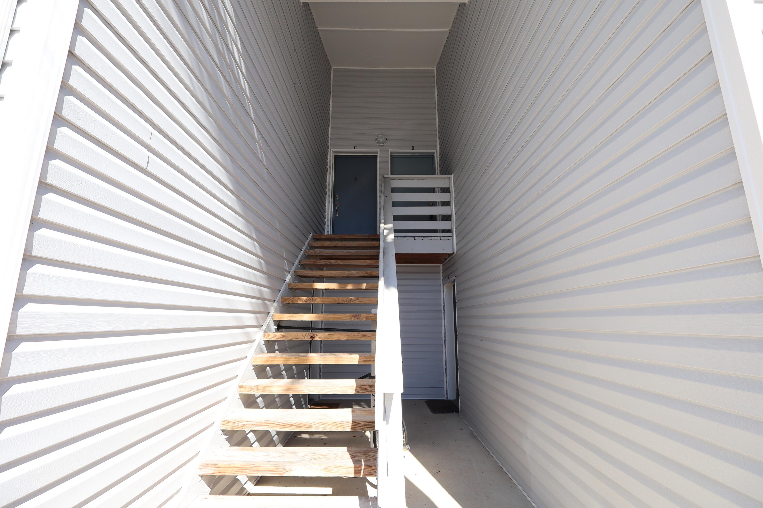 101 Old Ferry Road, Unit 36D Shalimar, FL 32579 - Photo 4 of 17 a view of entryway with wooden floor