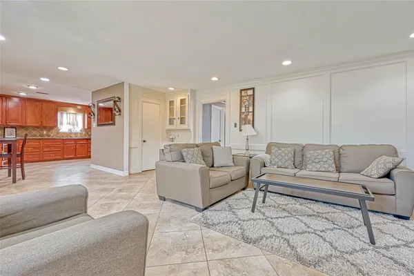 a living room with furniture and a couch