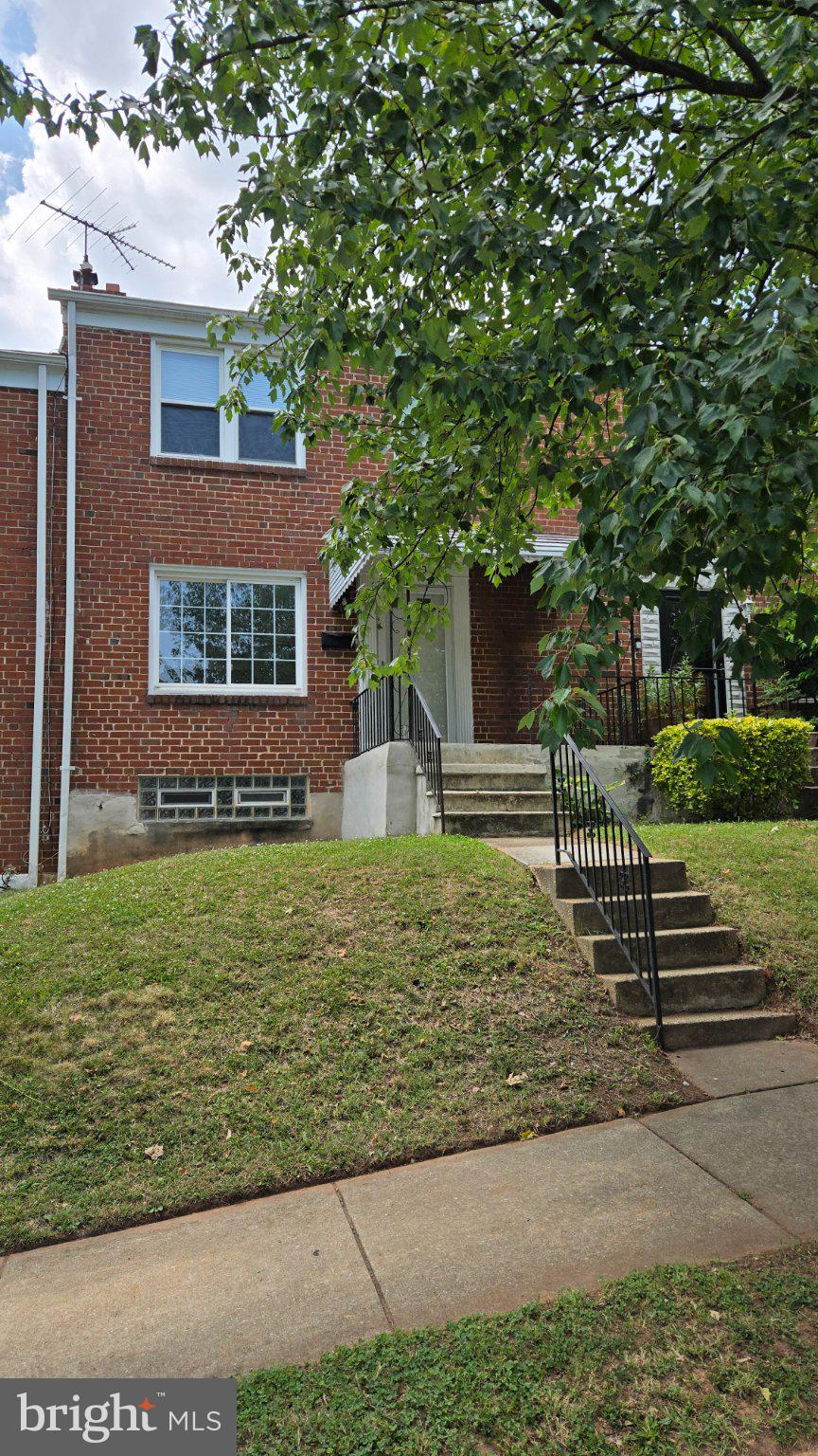 3820 Elkader Road Baltimore, MD 21218 - Photo 1 of 41 Charming brick home with inviting steps.