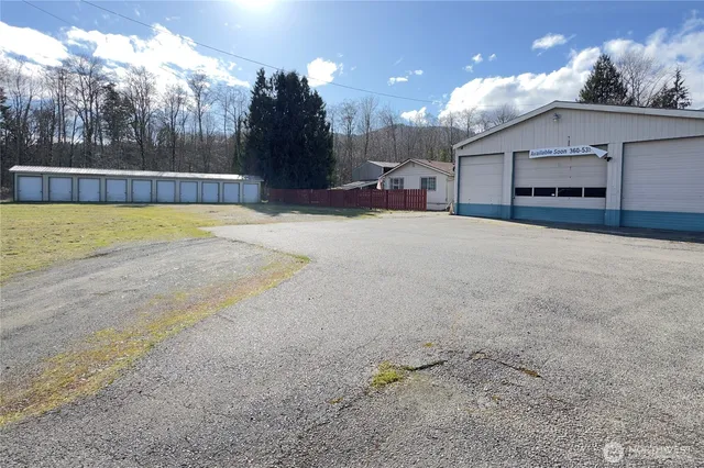 a swimming pool with a yard and a fountain