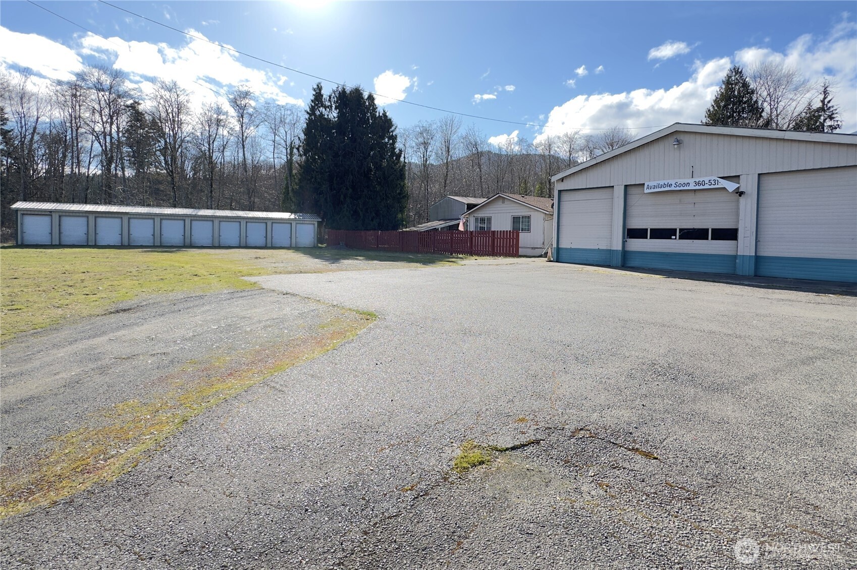152 Easy Street Brinnon, WA 98320 - Photo 3 of 9 a swimming pool with a yard and a fountain