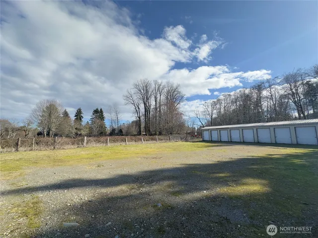 a view of a lake with a big yard
