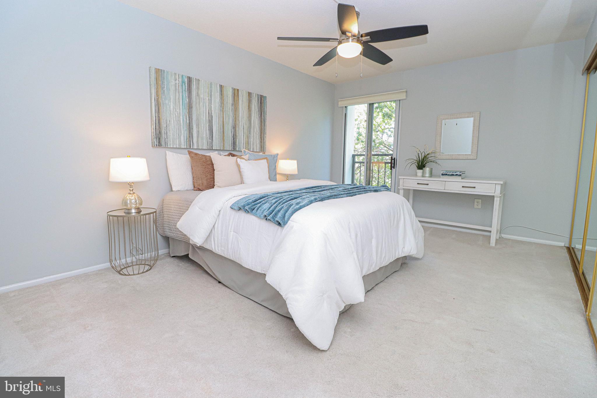 700 7th Street Southwest, Unit 608 Washington, DC 20024 - Photo 14 of 45 a bed room with a bed and window